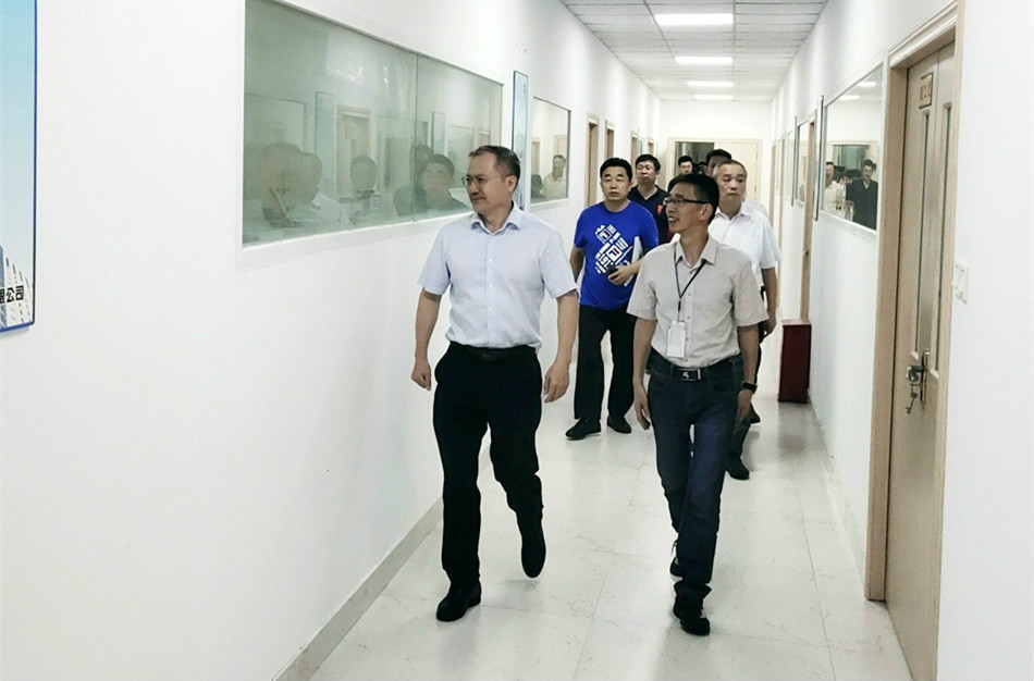 淄博市政协调研组考察中纺检测